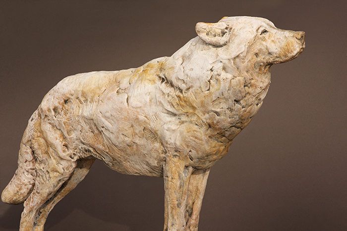 "The White Lady" Yellowstone gray wolf sculpture by George Bumann