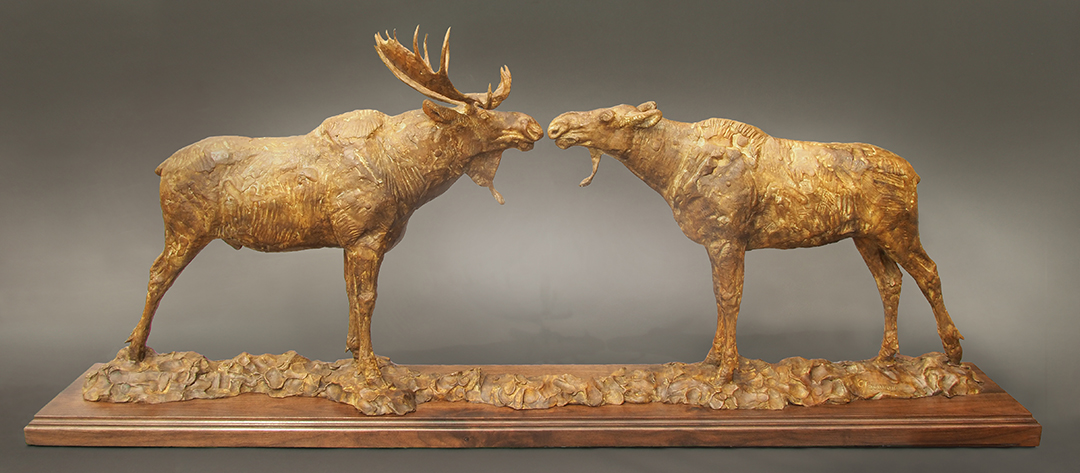 "Moosely Affections" Yellowstone moose sculpture by George Bumann