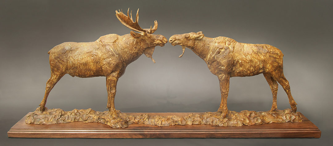 "Moosely Affections" moose sculpture by George Bumann