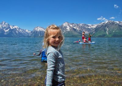 girl swimming Colter Bay Grand Teton National Park