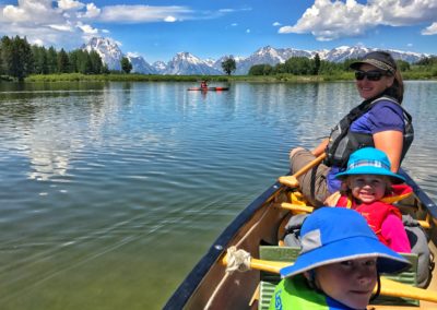 Kids canoeing the Snake River in Grand Teton National Park