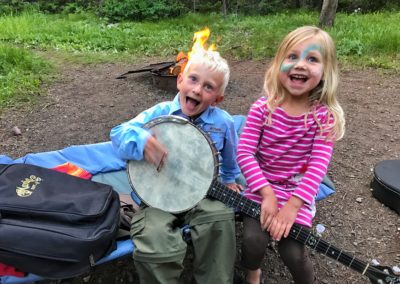 Kids playing the Banjo Grand Teton National Park