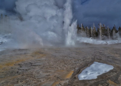 Grand Geyser Erupting at Old Faithful Geyser basin Yellowstone