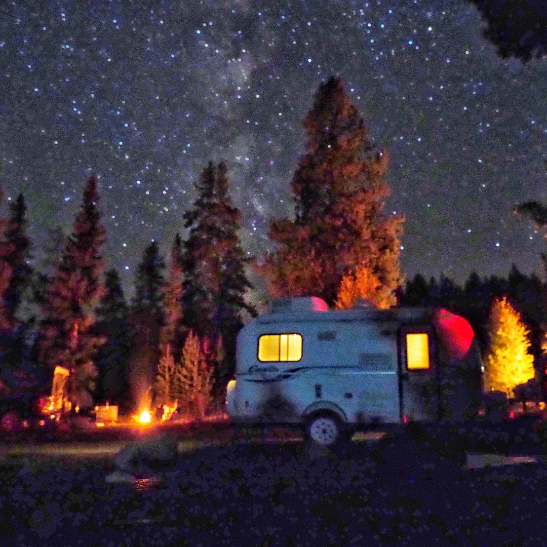 Camping in Yellowstone's fall color Milky Way